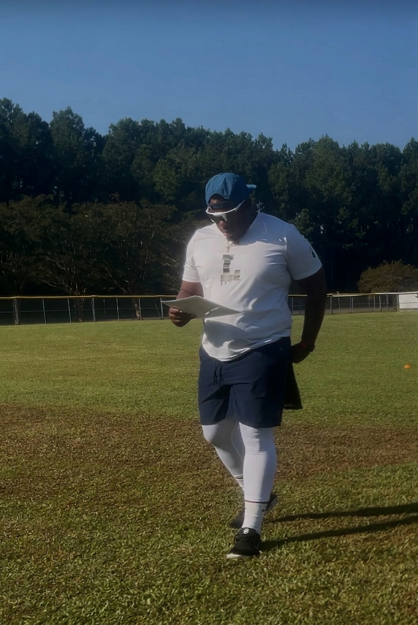 Coach on the field
